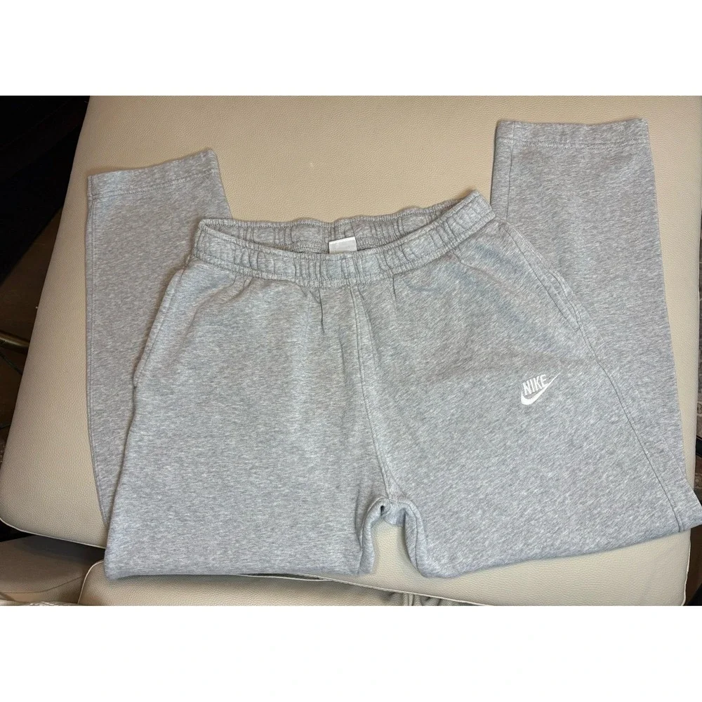 Men's large Nike Athletic Sweatpants Gray with white Nike swoosh.